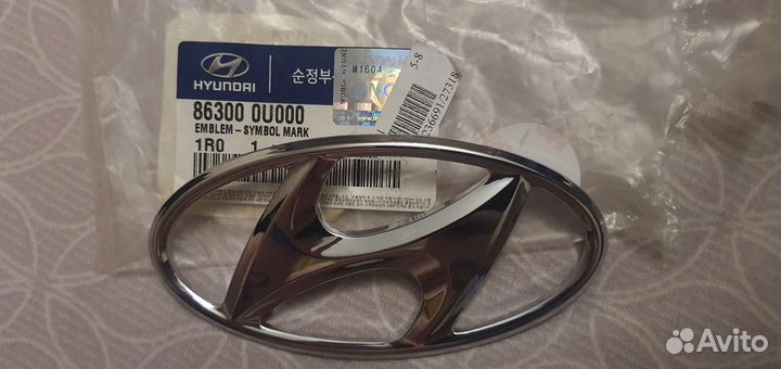Эмблема на крышку багажника Hyundai 86300-0U000