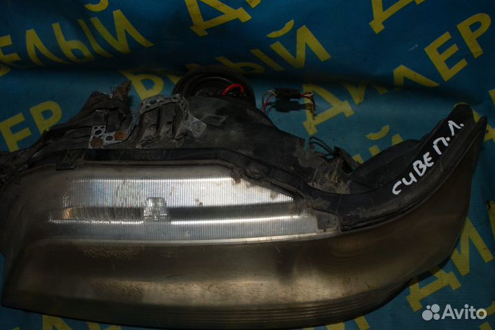 Фара Nissan Cube