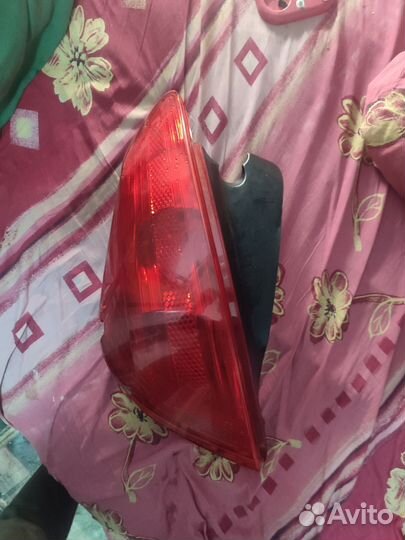Фонарь задний левый