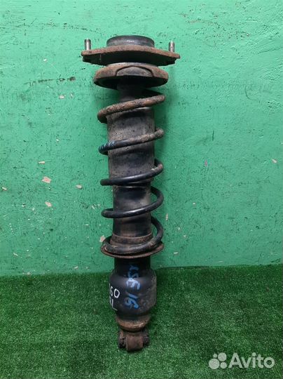 Стойка амортизатора задняя Subaru Legacy/ Outback