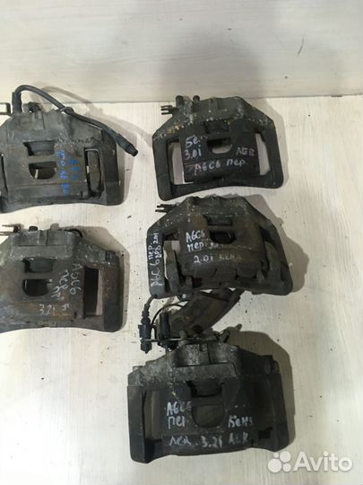 Суппорт тормозной передний левый Ауди А6 С6