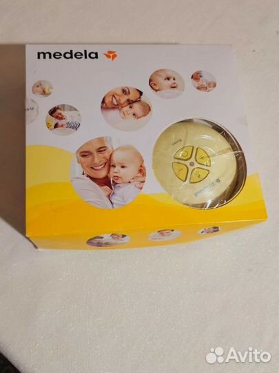 Молокоотсос medela электрический
