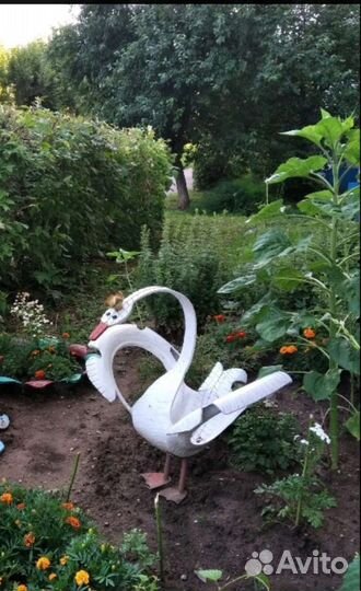 Лебеди из шин