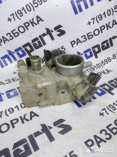 Дроссельная заслонка Mazda 323F 1996