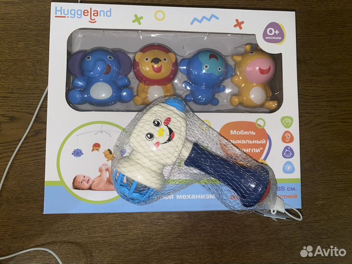 Мобиль джунгли и игрушка молоток