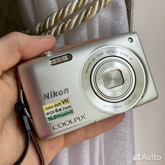 Компактная камера Sony, Nikon