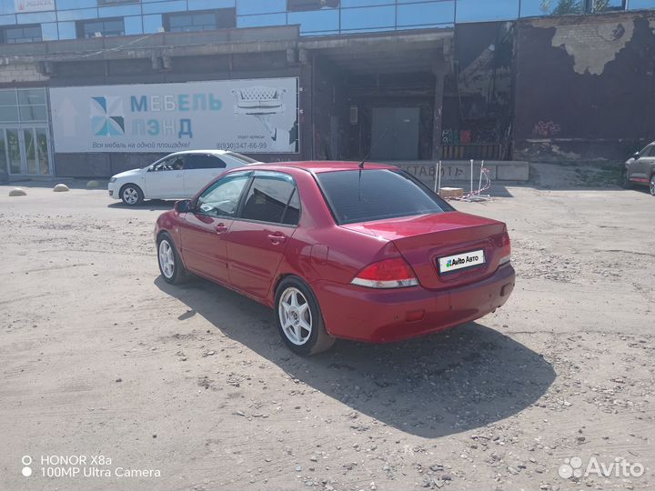 Mitsubishi Lancer 1.6 МТ, 2005, 305 000 км