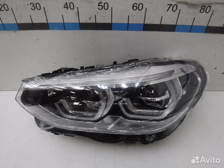 Фара левая BMW X3