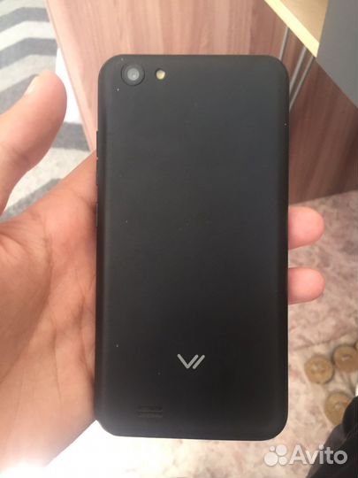 Телефон vertex