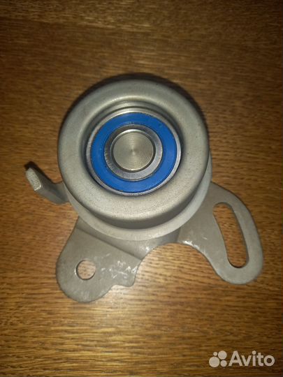 Ролик грм натяжной Мицубиси