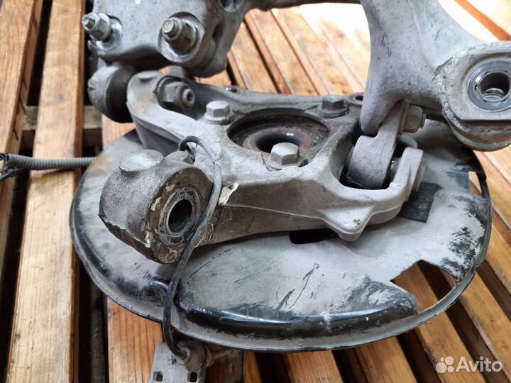 Кулак передний левый Opel Astra J GTC 2012