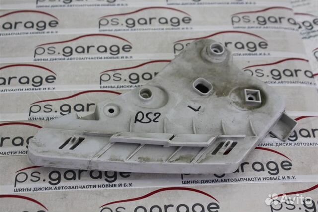 Кронштейн фар левый Nissan Pathfinder R52