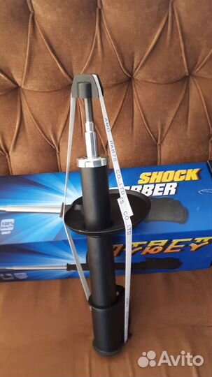 Амортизатор (стойка) передний Рено Логан Ларгус