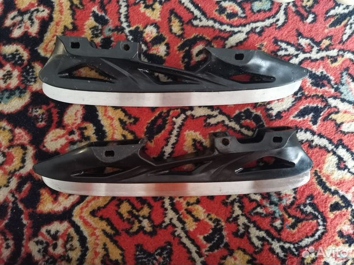 Роликовые коньки