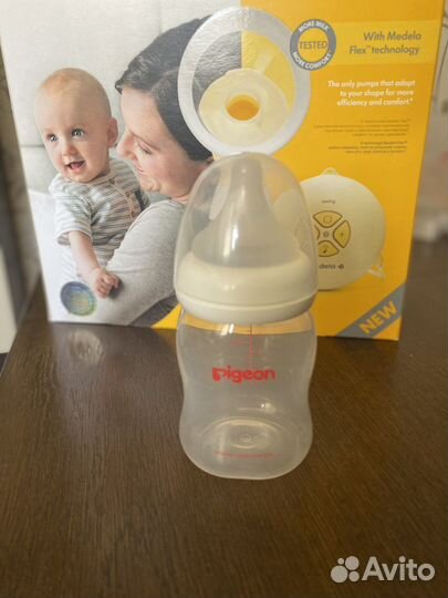 Молокоотсос medela