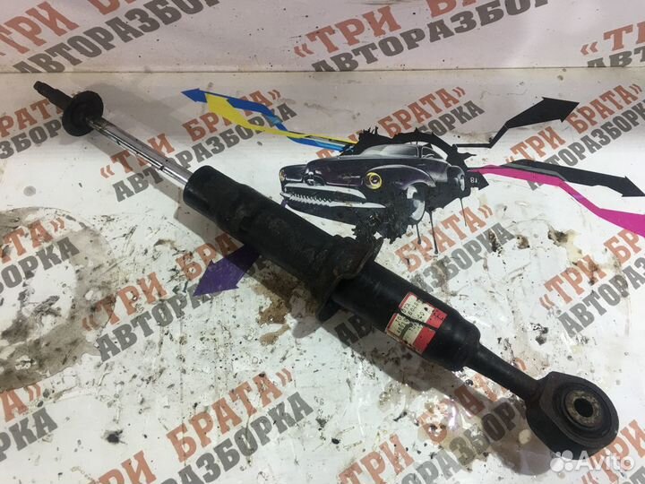 Тойота Ленд Крузер Амортизатор передний левый Лев