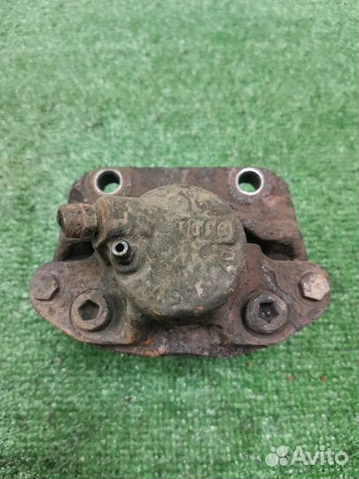 Суппорт тормозной передний правый Renault Logan