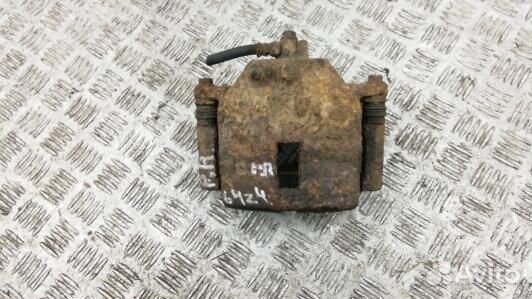 Суппорт тормозной передний правый nissan primera P