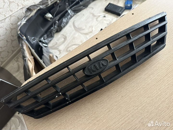 Решетка радиатора Kia Spectra