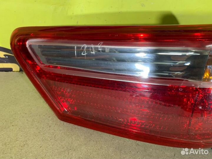 Фонарь заднего хода левый Toyota Camry ACV40
