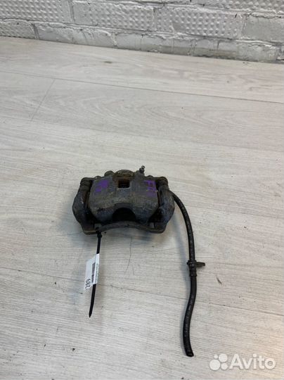 Суппорт тормозной передний левый Honda Civic 4D