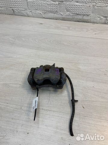 Суппорт тормозной передний левый Honda Civic 4D