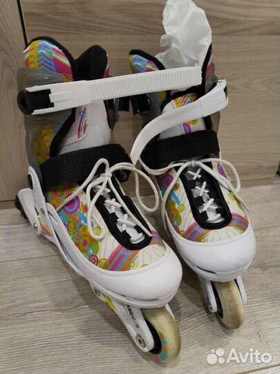 Роликовые коньки