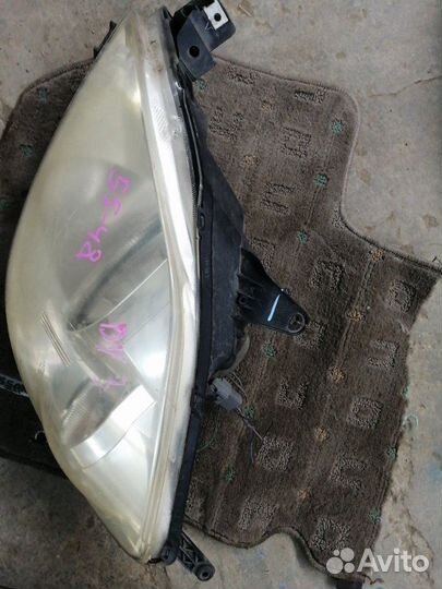 Фара передняя левая Mazda Demio DY