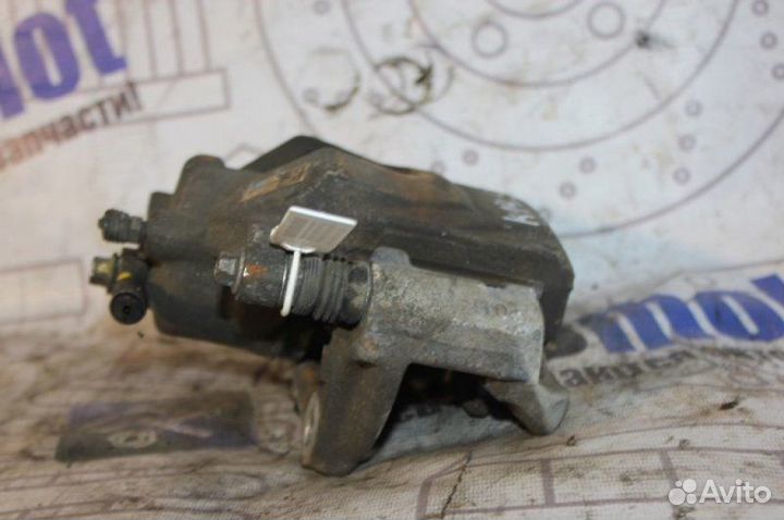 Суппорт передний правый Chevrolet Cruze J300