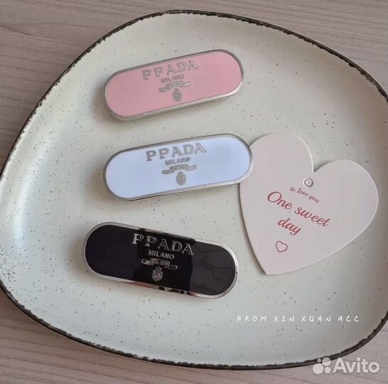 Заколки Prada