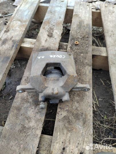 Суппорт передний левый Chevrolet Cruze