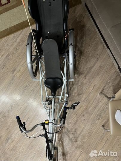 Трехколесный велосипед с детским креслом