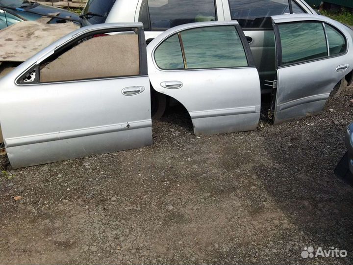 Двери nissan cefiro a32