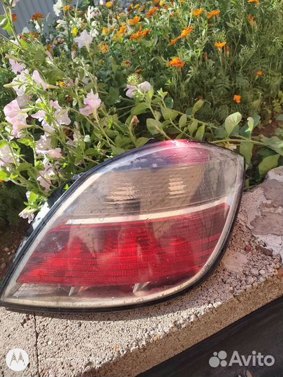 Задний фонарь Опель астра н хэтчбэк