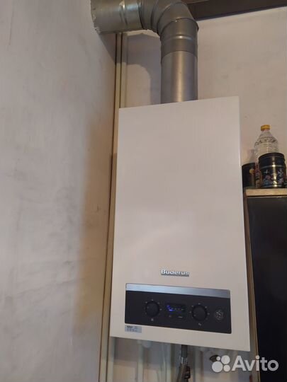 Газовый котел двухконтурный Buderus 044