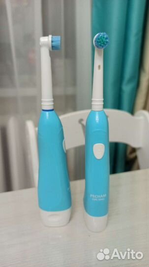 Электронная зубная щетка