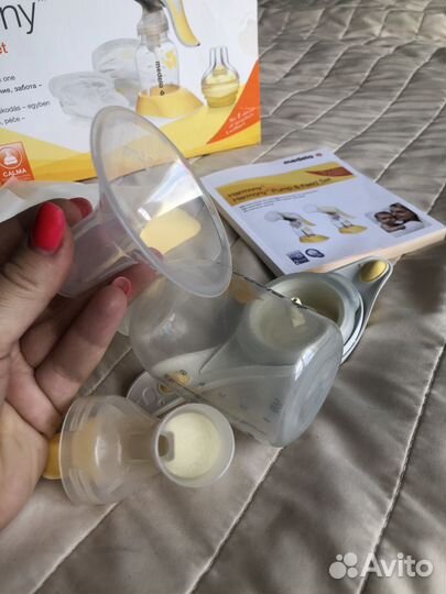 Молокоотсос medela ручной