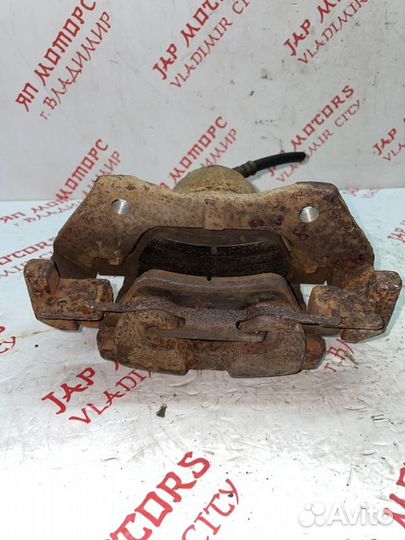 Суппорт тормозной передний левый Ford Escape L3