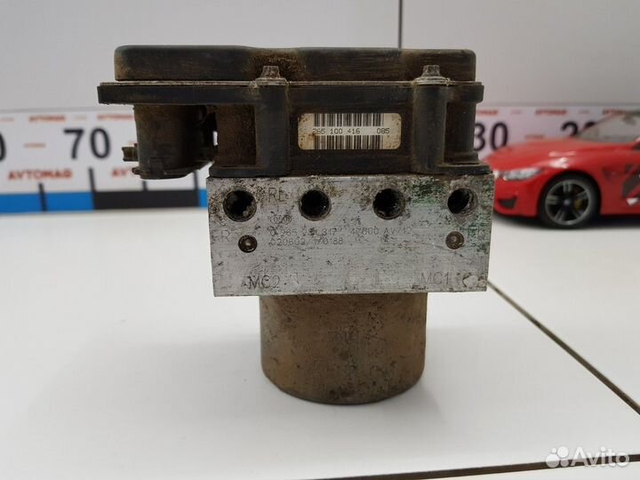 Блок ABS (насос) (Nissan Primera)