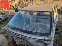 Стекло переднее Renault Logan 1.6 K7M710 (84) 2011