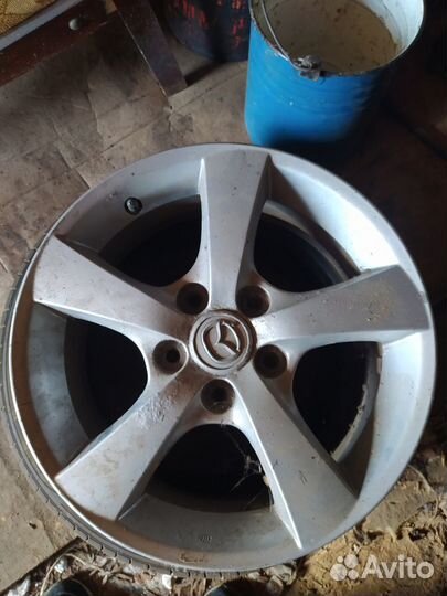 Диск литой мазда R-16