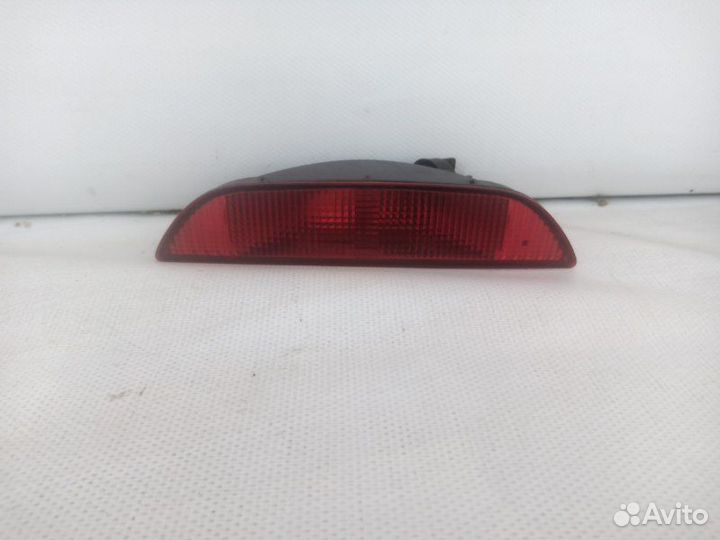 Фонарь противотуманный задний Nissan Note E11 2006