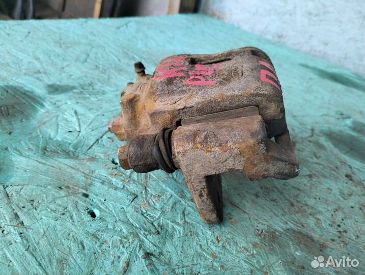 Суппорт передний левый KiaRio 1 рестайлинг