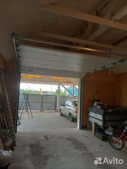 Секционные ворота алютех