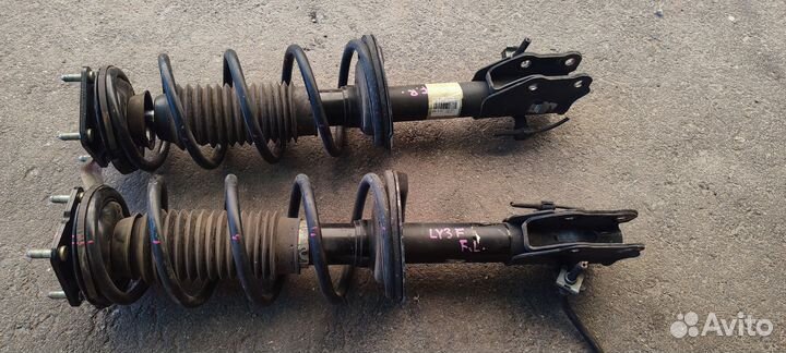 Передние стойки амортизатора mazda MPV 2010