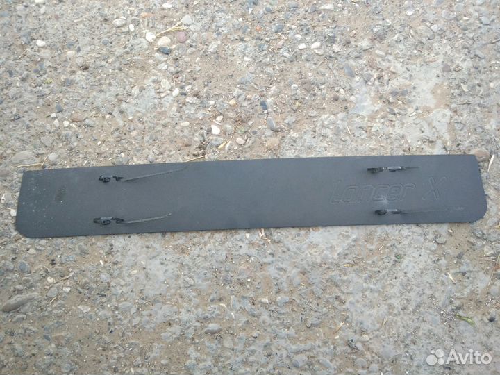 Заглушка решетки бампера Mitsubishi lanser X