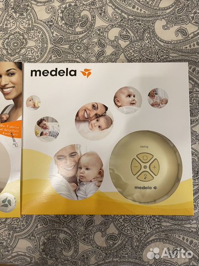 Молокоотсос электрический Medela
