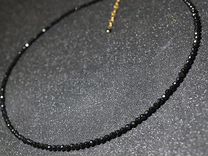 Модное ожерелье с черными бусинами
