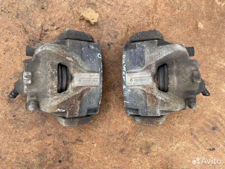 Суппорт тормозной передний Renault Duster 4WD