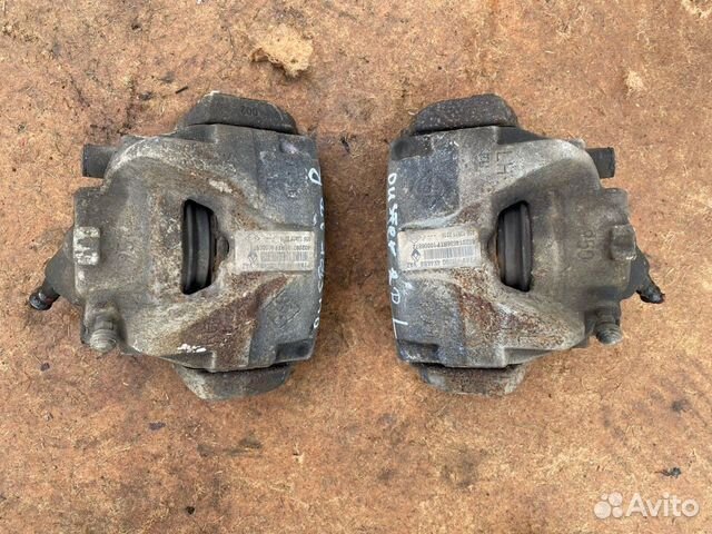 Суппорт тормозной передний Renault Duster 4WD